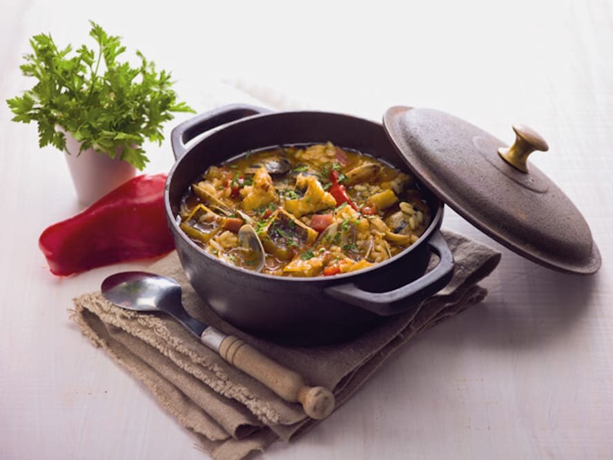 Arroz de bacalhau com presunto, amêijoas e três pimentas